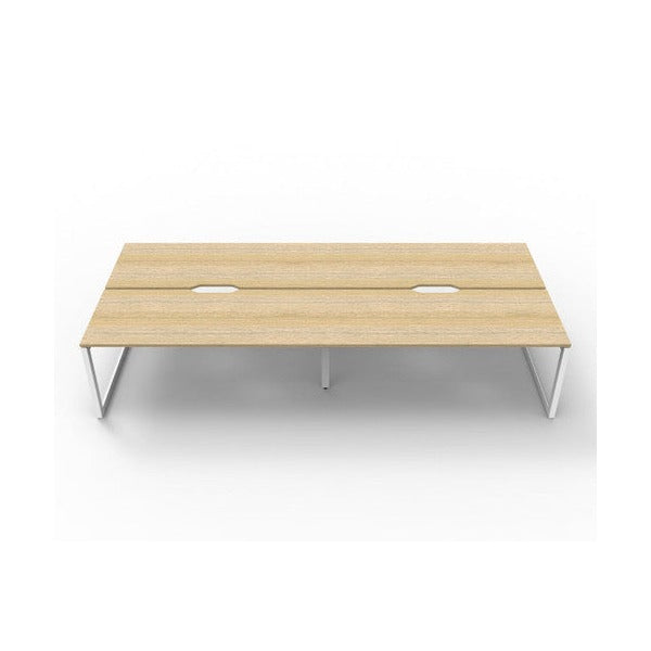 Rapidline Deluxe Infinity 4 person back to back workstation in Natural Oak with White Satin loop legs, low front view along the run