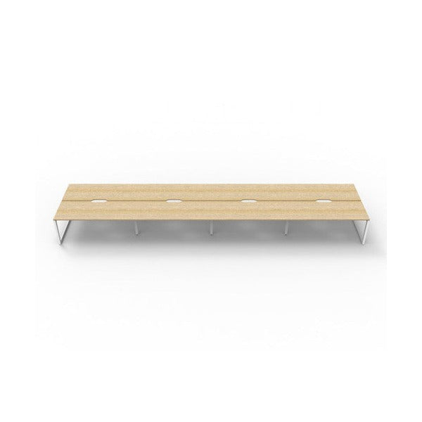Rapidline Deluxe Infinity 8 person back to back workstation in Natural Oak with White Satin loop legs, low front view along the run