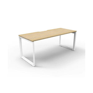 Rapidline Deluxe Infinity single sided loop leg desk in Natural Oak top with White Satin loop legs, angled view from the front corner