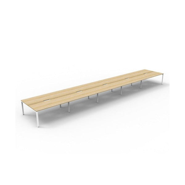 Rapidline Deluxe Infinity back to back profile leg workstation with Natural Oak top and White Satin base, wide angled studio view without screens