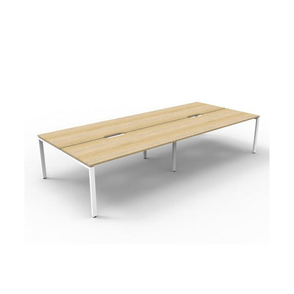 Rapidline Deluxe Infinity back to back profile leg workstation with Natural Oak top and White Satin base, wide angled studio view without screens