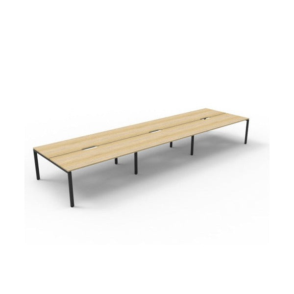 Rapidline Deluxe Infinity back to back profile leg workstation with Natural Oak top and Black Satin base, wide angled studio view without screens