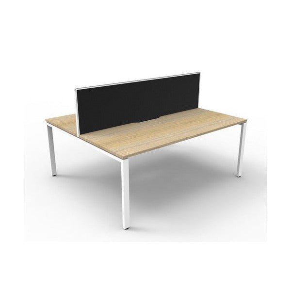 Rapidline Deluxe Infinity back to back two person workstation with Natural Oak tops on a White Satin base and a black fabric dividing screen, three quarter view from the front
