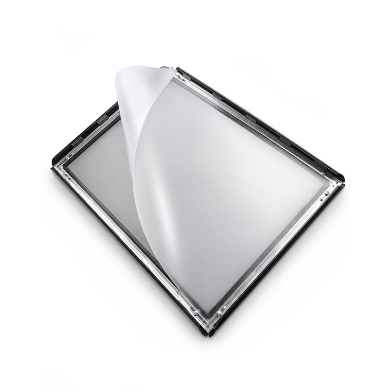 The black A3 snap frame lying open on a white background with the clear anti-glare cover sheet peeled back from one corner, showing the empty backing board and the four spring loaded sides.