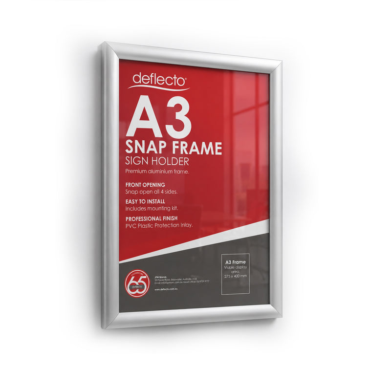 Deflecto A3 silver snap frame on a white wall holding its own red and grey information poster, which lists front opening with snap open on all four sides, an included mounting kit, a PVC protection inlay, and a visible display area of 275 by 400mm.