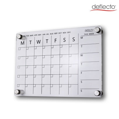 Deflecto A4 acrylic wall planner on a white wall, showing the printed month tick row from January to December, the Monday to Sunday monthly grid and the This Week column, held on four chrome standoff fixings.