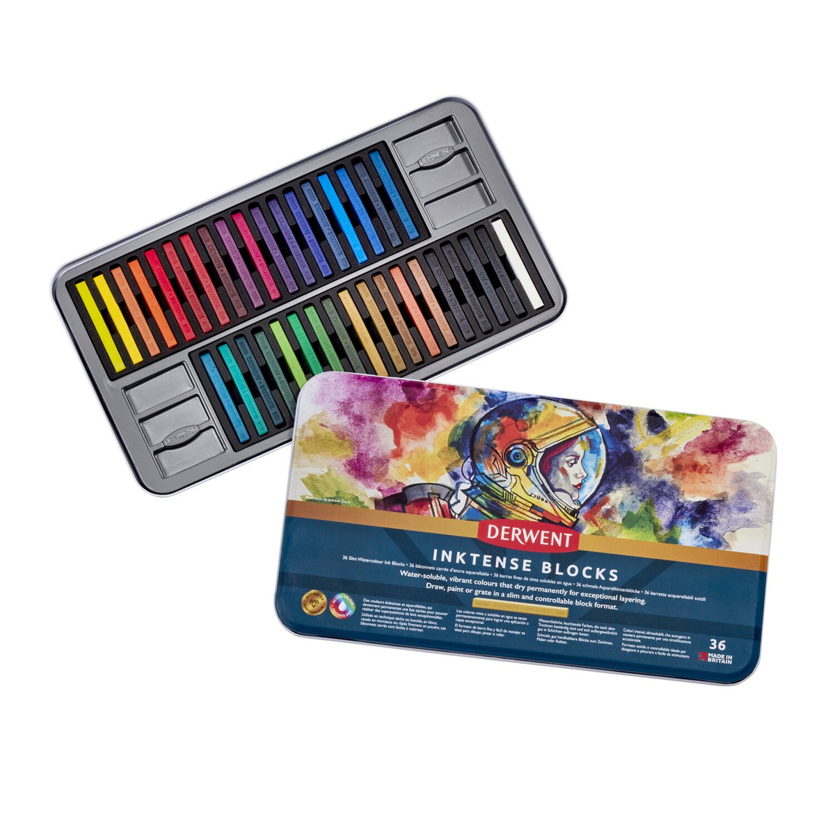 Derwent Inktense Blocks Tin of 36 opened, a wide tray of coloured blocks in two rows with the astronaut-artwork lid in front