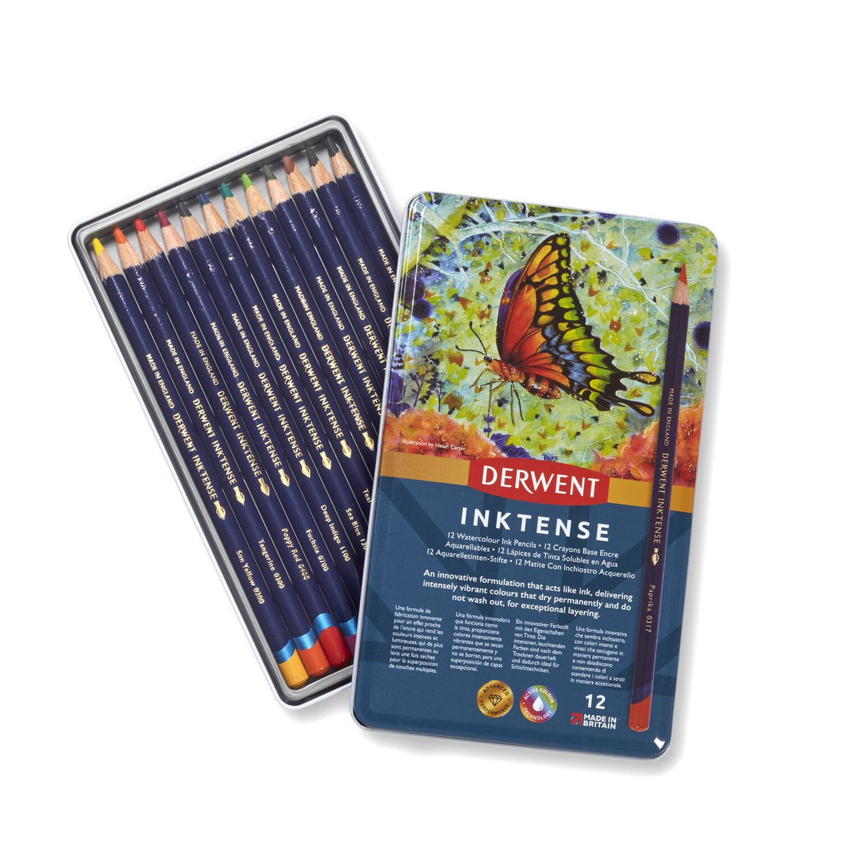 Open Derwent Inktense 12 pencil tin with the butterfly-design lid set beside a tray of 12 blue-barrelled Inktense pencils