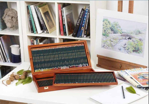 Derwent Artists Pencil Deep Cadmium Box of 6. Derwent Artists Pencil aquamarine barrel with double-dipped curved end detail.