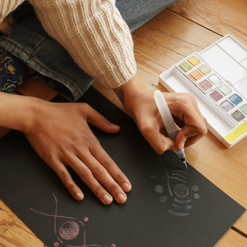 Derwent Academy Black Mixed Media Pad A4. Derwent Academy A4 pad next to Derwent Metallics pencil collection.