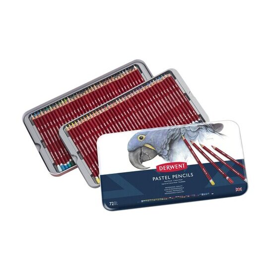 Two trays of Derwent pastel pencils fanned out behind the 72 tin lid, dark red barrels with coloured ends