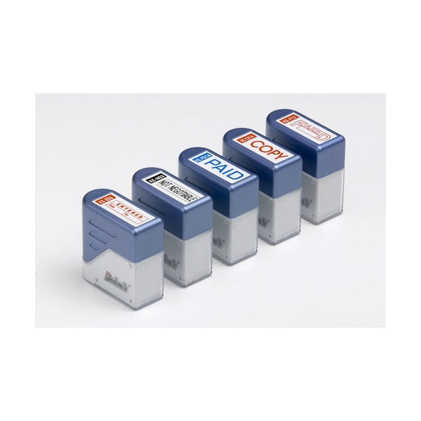 Row of Deskmate pre-inked office stamps with blue tops and grey bodies, each carrying a different message, showing the stamp body style