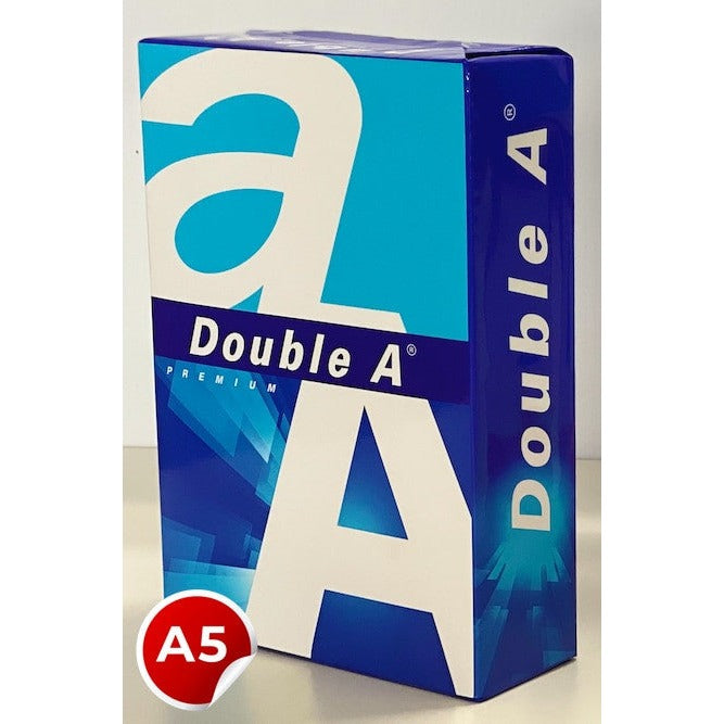 Photograph of a Double A Premium A5 ream in the white and blue wrapper standing upright on a grey bench, with a red A5 size badge overlaid.
