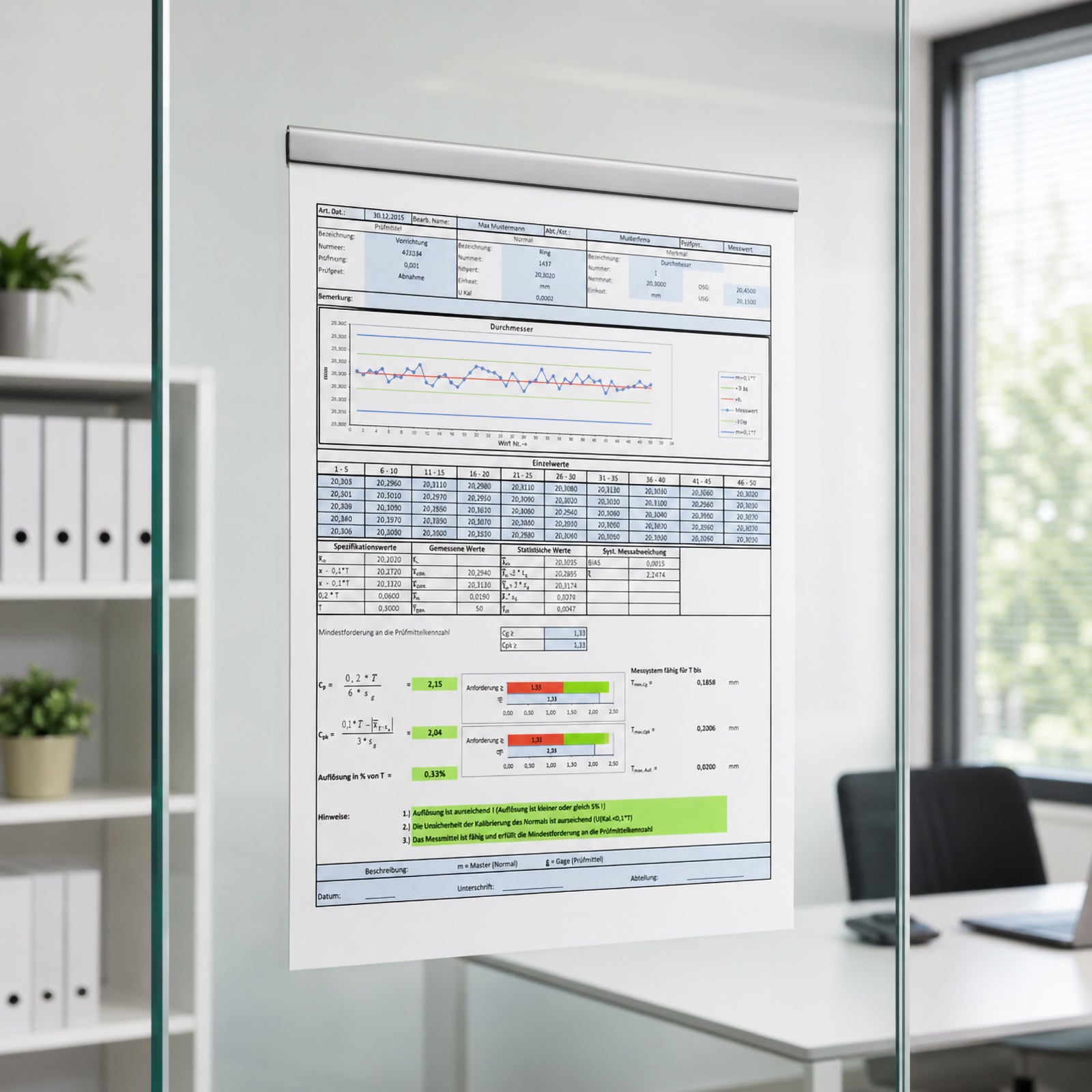 Durable Durafix silver magnetic strip attached to a glass meeting room wall holding an A4 technical report. The image showcases the bubble free appearance and elegant presentation on transparent glass surfaces.