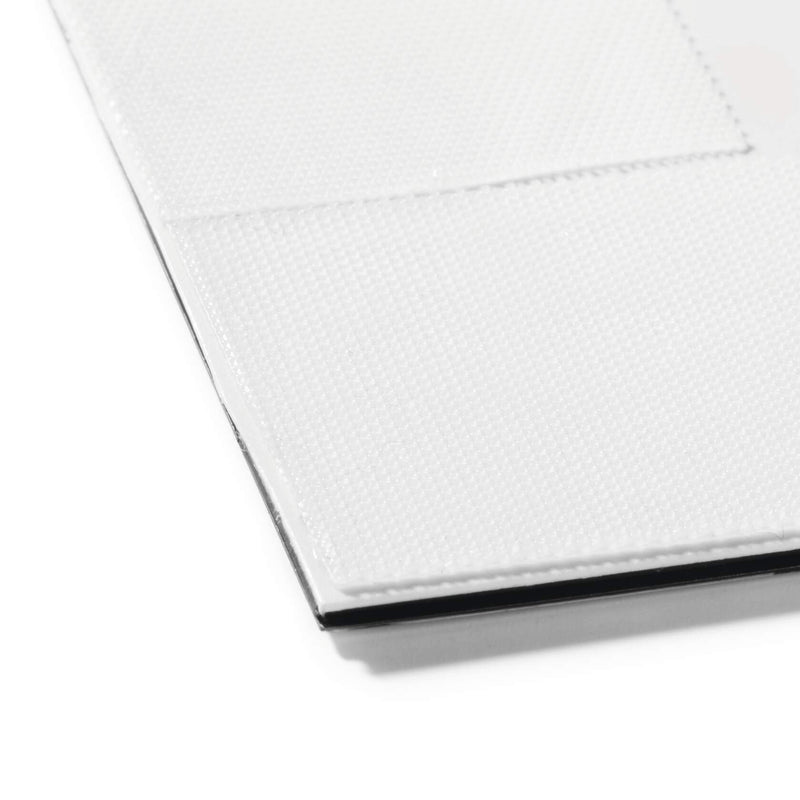 Close up view of the specialised textile grip backing on the Durable DURAFRAME Grip Textile Surface A4 Black. The detailed texture illustrates the secure grip material designed for attachment to fabric panels and acoustic office walls.