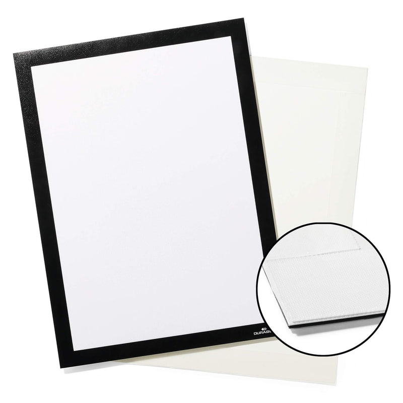 Studio product image of the Durable DURAFRAME Grip Textile Surface A4 Black with backing sheet displayed against a white background. An inset magnifies the textile grip backing, highlighting the specialised attachment surface and premium construction.
