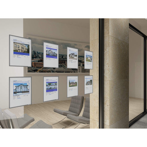 Row of grey Duraframe Info Frames with property listings clinging to an office glass wall