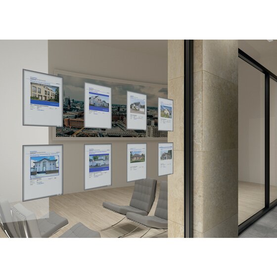 Several grey Durable Info Frames showing property listings on a glass wall in an office waiting area