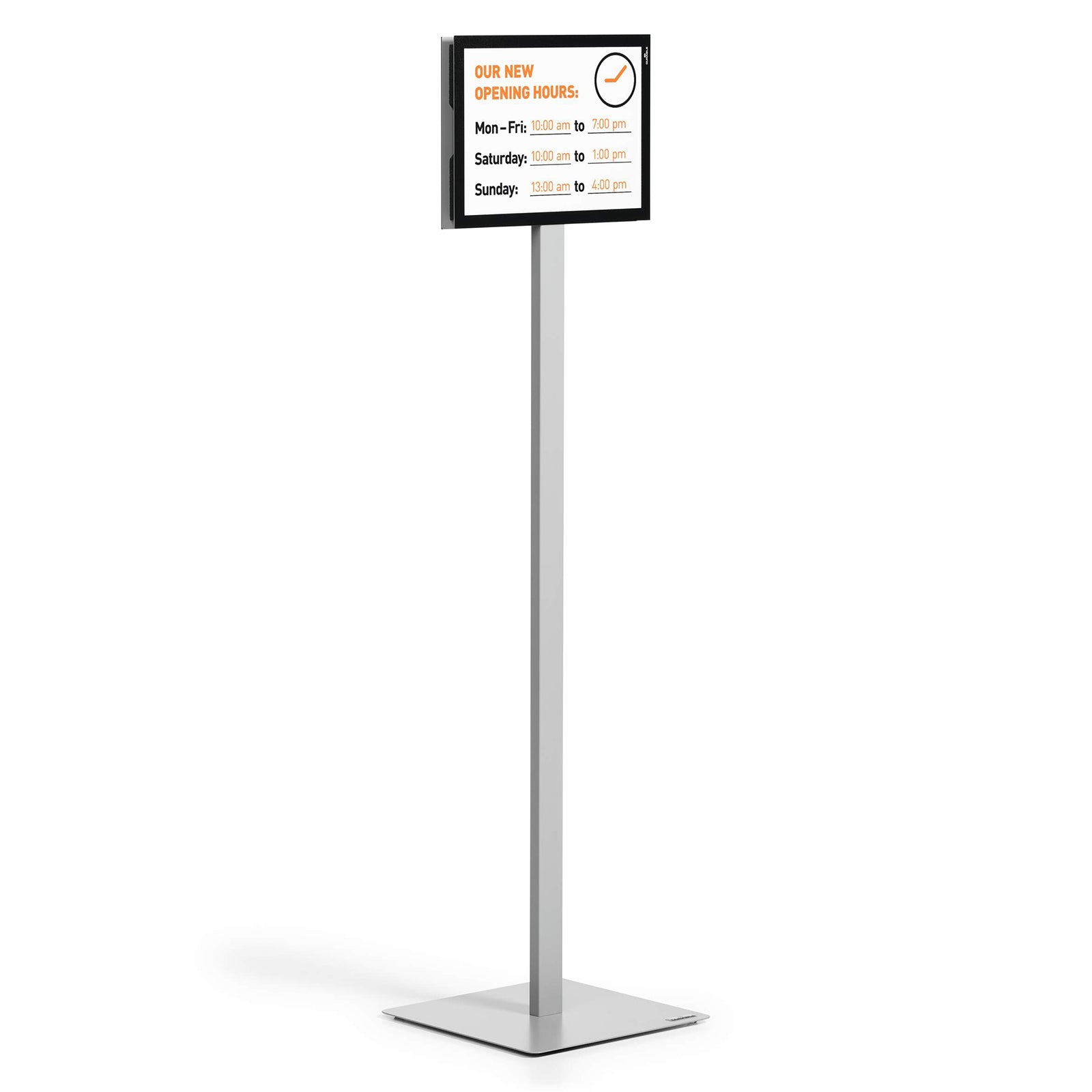 Front studio view of the Durable Info Stand Floor Basic A4 Silver displaying business opening hours in landscape orientation. The clean silver stand and premium black frame provide a professional presentation suitable for commercial spaces.