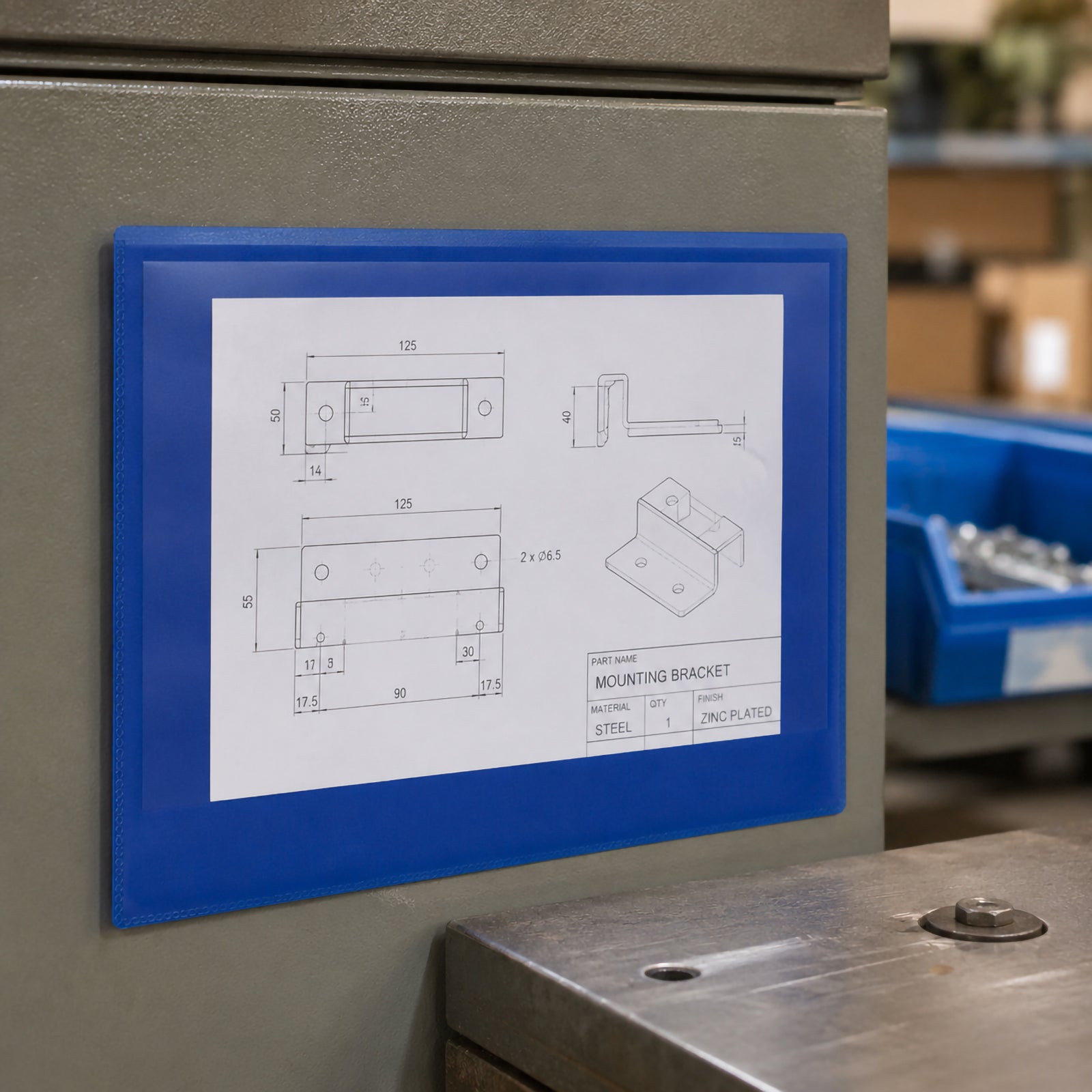 Close up of the Durable A4 Landscape Magnetic Document Pouch mounted on industrial equipment displaying an engineering drawing. The transparent front protects important technical documents while keeping them clearly visible in a workshop environment.