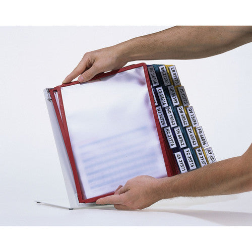 Hands turning a red framed panel on a VARIO stand
