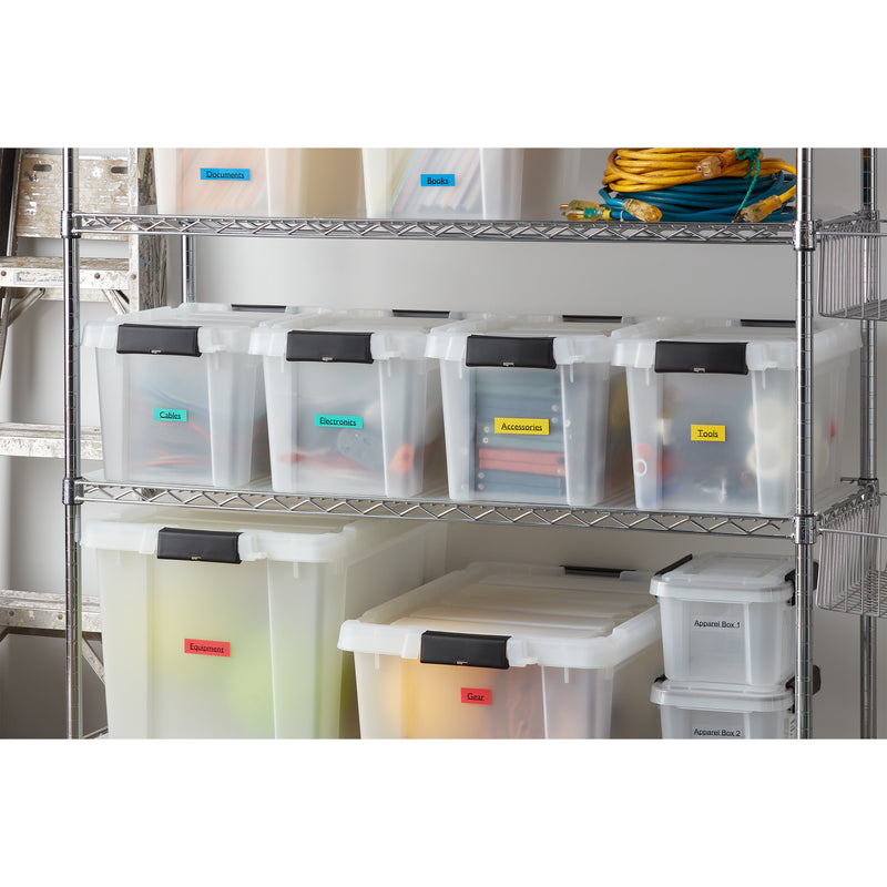Storage tubs on wire shelving marked with Dymo D1 labels