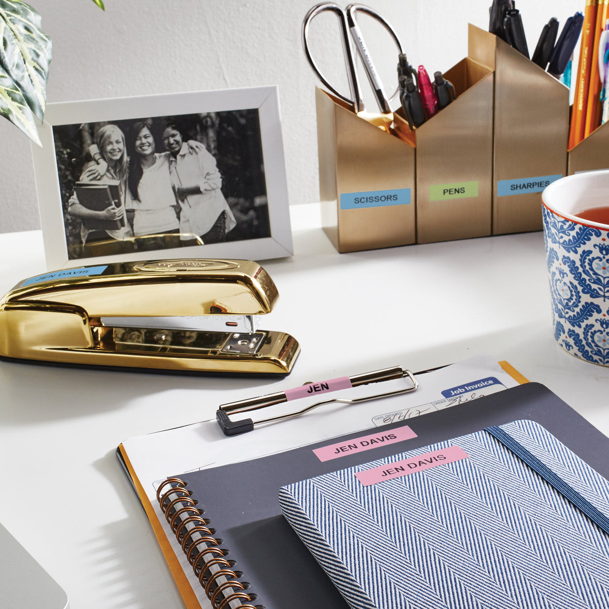 Pastel LetraTag labels on a planner and desk stationery