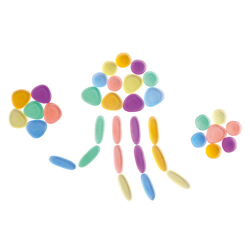 Close-up of smooth tactile pebbles showing colour variety