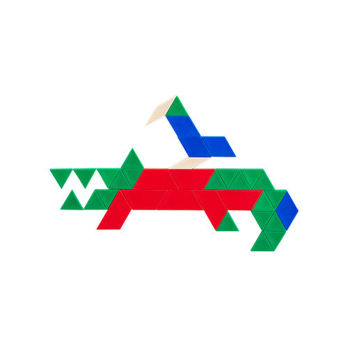 Pattern blocks arranged to form a geometric flower shape on a white background
