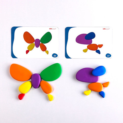 Close-up of tactile plastic pebbles in red, orange, yellow, green, blue, and purple