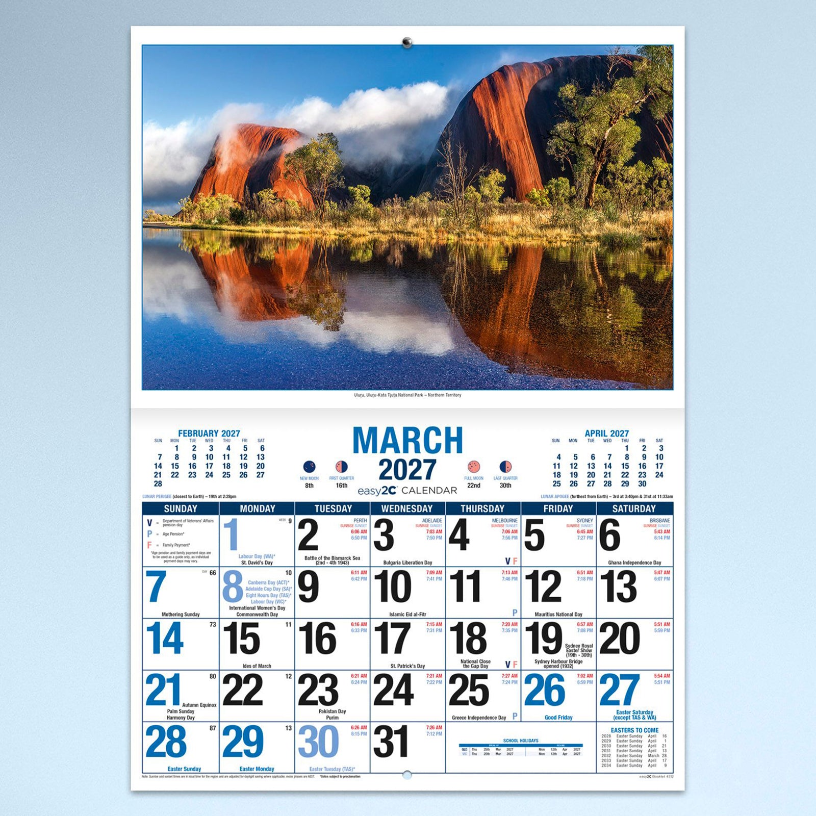 March calendar page displaying the striking red formations of Uluru reflected in still water, combined with a bold monthly planner designed for organising work, family and personal events.
