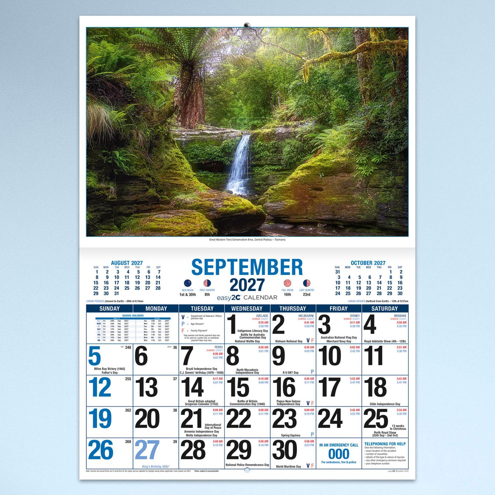 September calendar page highlighting a lush Tasmanian rainforest waterfall surrounded by vibrant green ferns, with a spacious monthly calendar providing room for appointments and reminders.