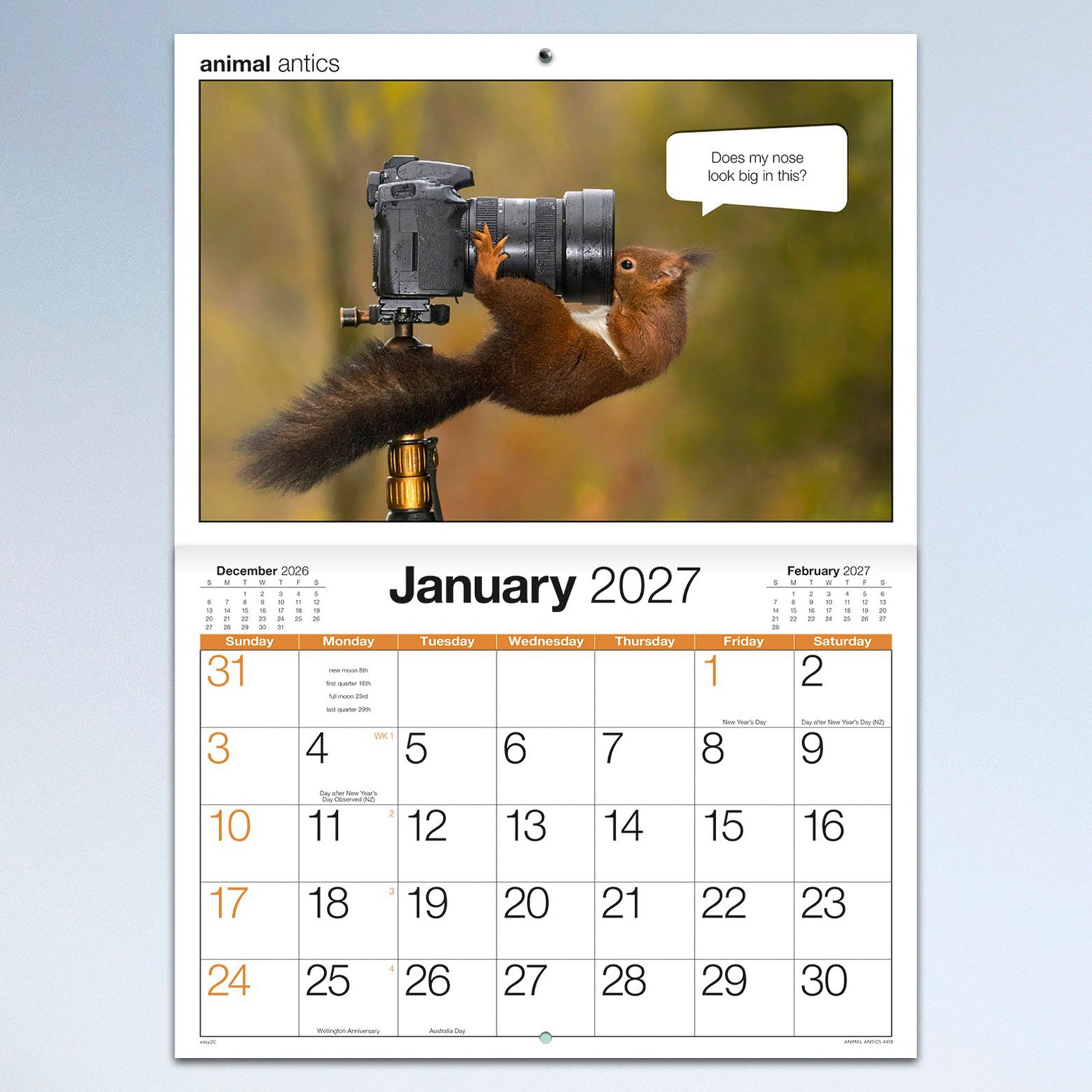 The January calendar page featuring a playful squirrel interacting with a camera and humorous speech bubble, paired with a large monthly planning grid for organising the start of the year.