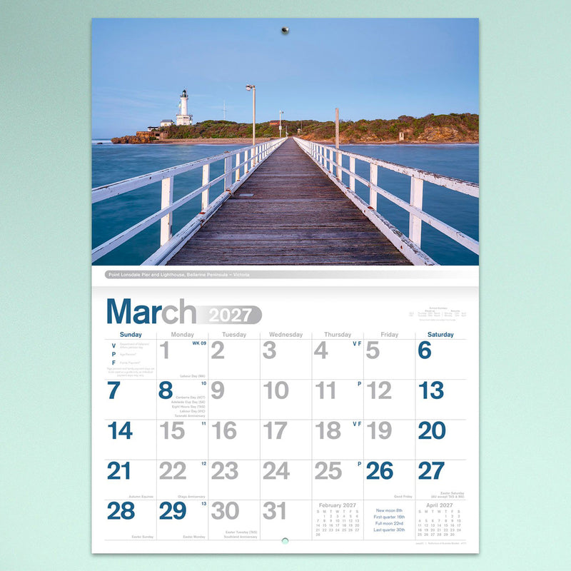 The March calendar page featuring the Point Lonsdale Pier and Lighthouse in Victoria with a striking perspective leading toward the historic lighthouse above the monthly planner.