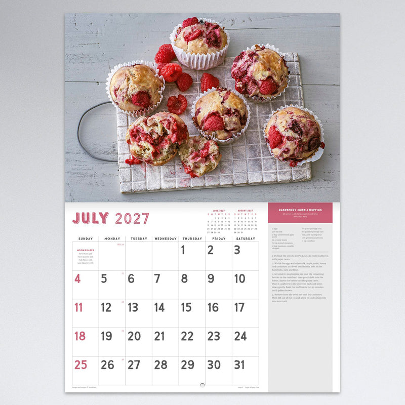 July calendar page featuring raspberry muffin photography and recipe with a spacious monthly layout, ideal for organising appointments while discovering seasonal baking inspiration.