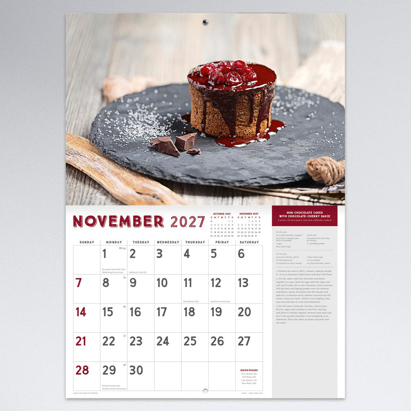 November calendar page featuring a mini chocolate cake with chocolate cherry sauce recipe. The monthly planner provides generous writing space alongside the complete recipe instructions.