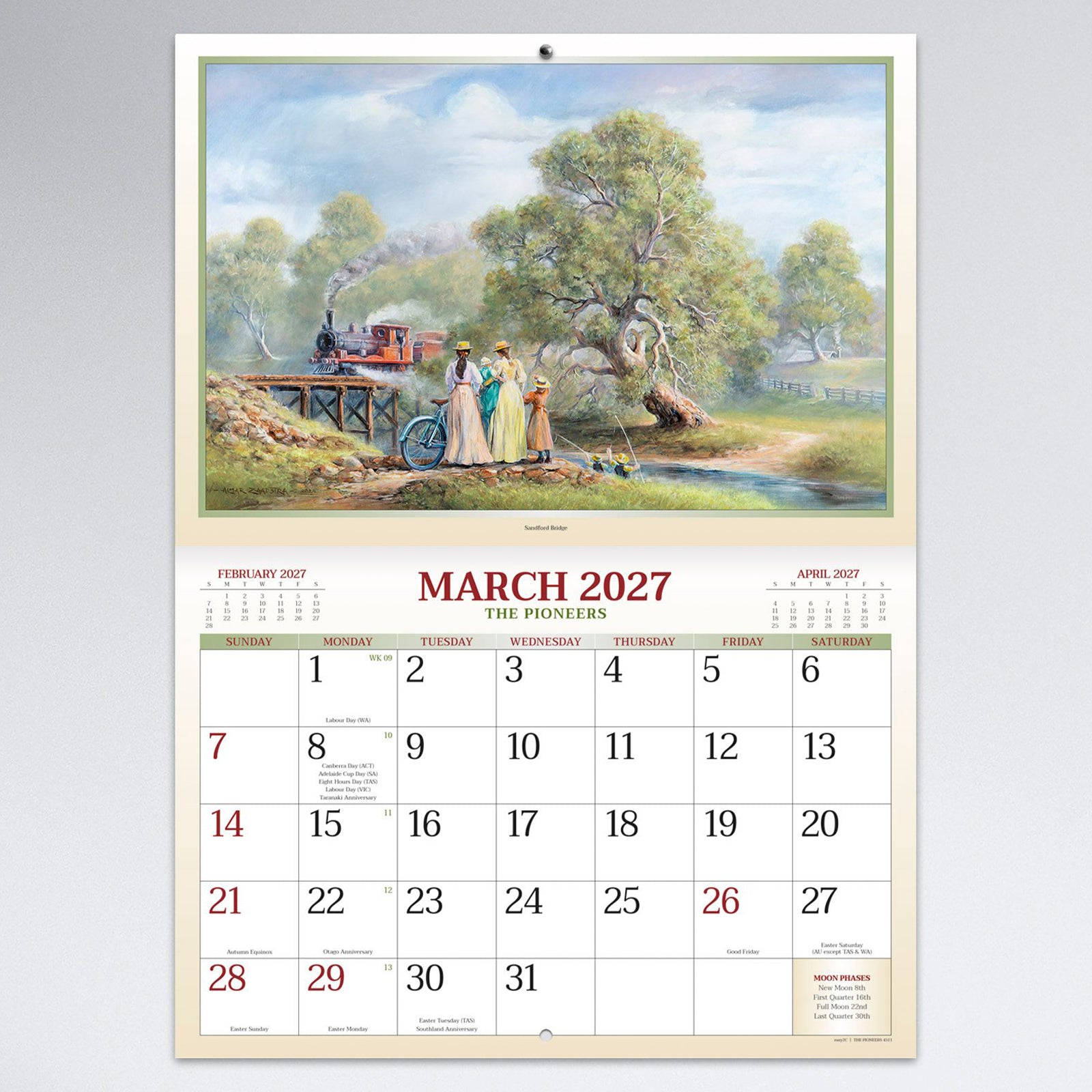 March calendar page displaying a tranquil pioneer family beside a steam train and river crossing with generous monthly date boxes for organising events.