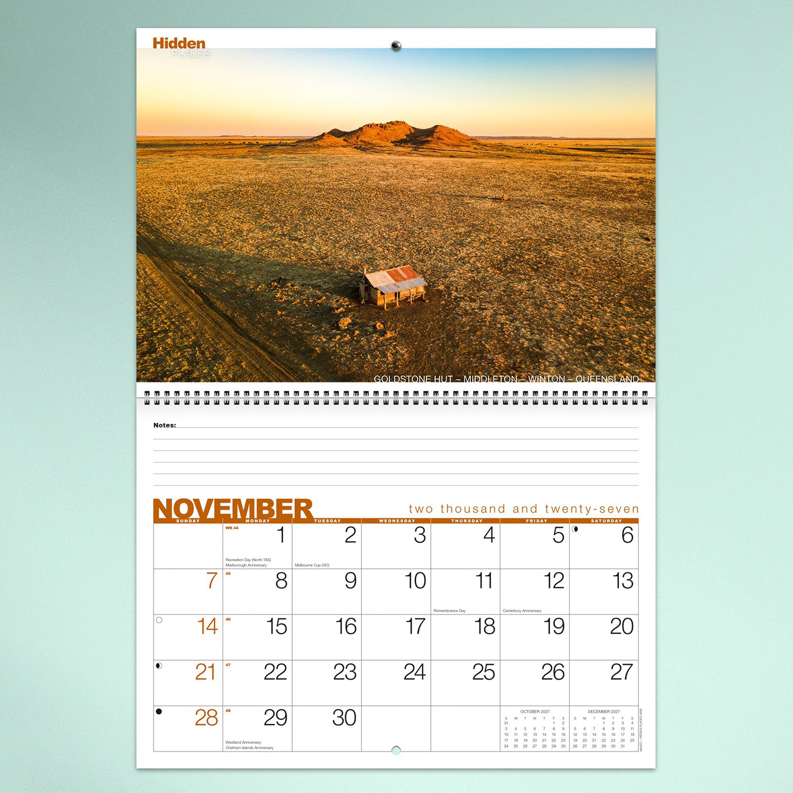The November calendar page highlighting an expansive Queensland outback landscape with a remote hut surrounded by open plains. The monthly planner below offers large date boxes for organising appointments and reminders.