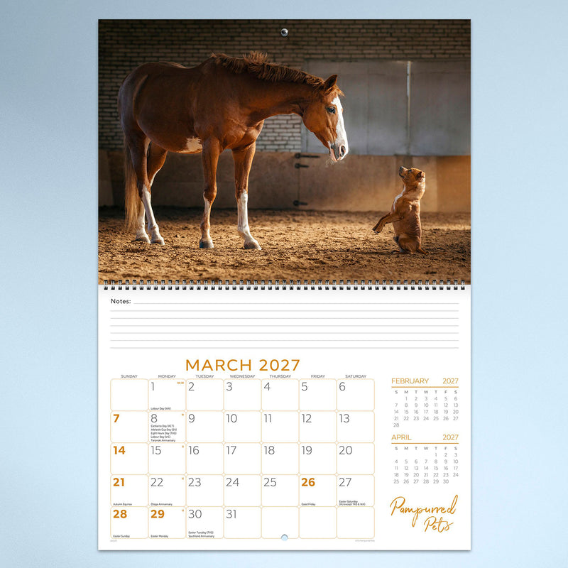 March calendar page featuring a gentle horse interacting with a small dog inside a stable. The touching animal friendship creates an engaging calendar display with generous planning space.