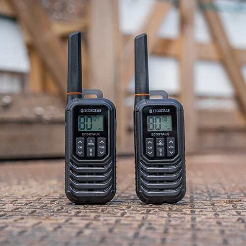 EcoXgear EcoXTalk IP54 UHF radio pair in outdoor worksite setting