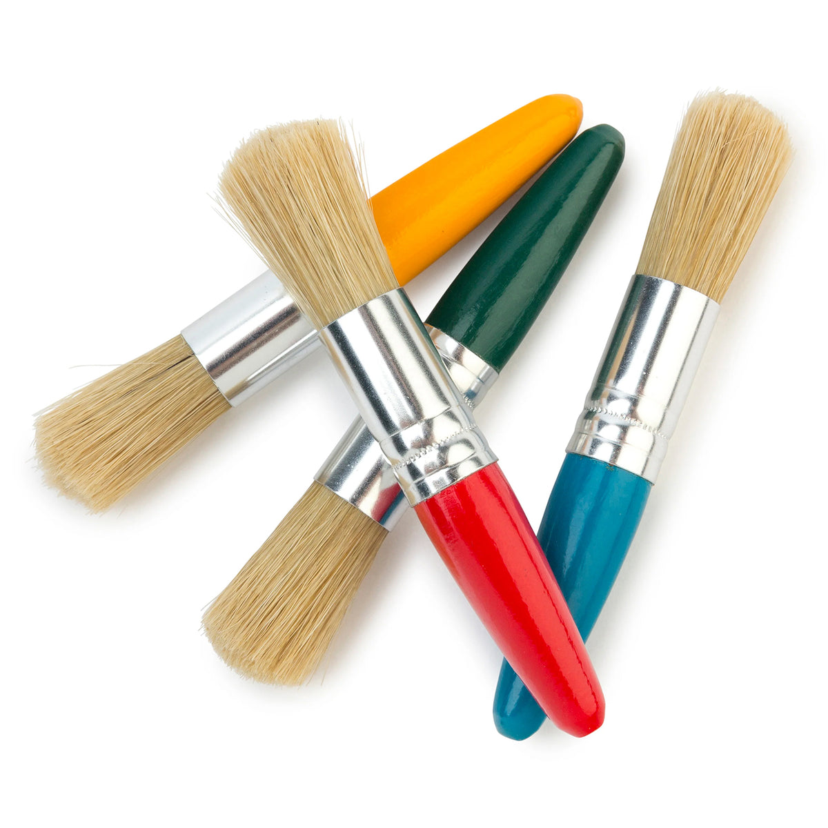 Close up product view of four Educational Colours Baby Stubby Brushes crossed together against a clean white background. The image highlights the assorted red, blue, yellow and green short handles, shiny metal ferrules and broad natural coloured bristle heads designed for young children's painting activities.