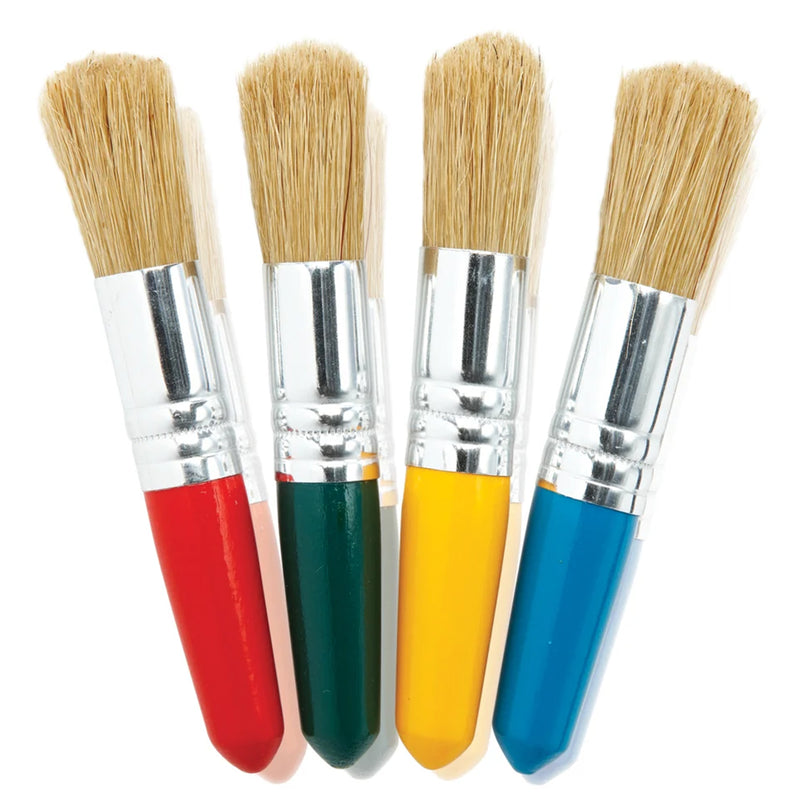 Front view of four Educational Colours Baby Stubby Brushes on a white background, clearly showing the compact 100mm design. Each brush features a different coloured short handle in red, green, yellow and blue with a silver ferrule and broad bristle head for early childhood painting and art projects.