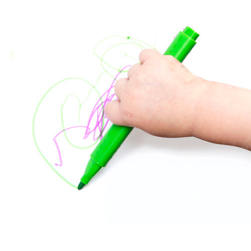 Child holding an Easi-Grip triangular marker demonstrating correct tripod grip