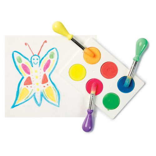 Child using a wet brush on First Creations fluoro watercolour blocks during an art activity