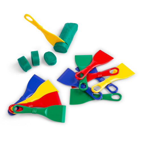 Educational Colours Mini Dough Cutters Set of 12. Child using Educational Colours Mini Dough Cutters to cut shapes from modelling clay.