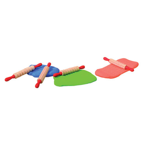 Educational Colours Mini Pattern Rolling Pins 19cm Set of 6. Child using an Educational Colours Mini Pattern Rolling Pin to imprint patterns onto dough.