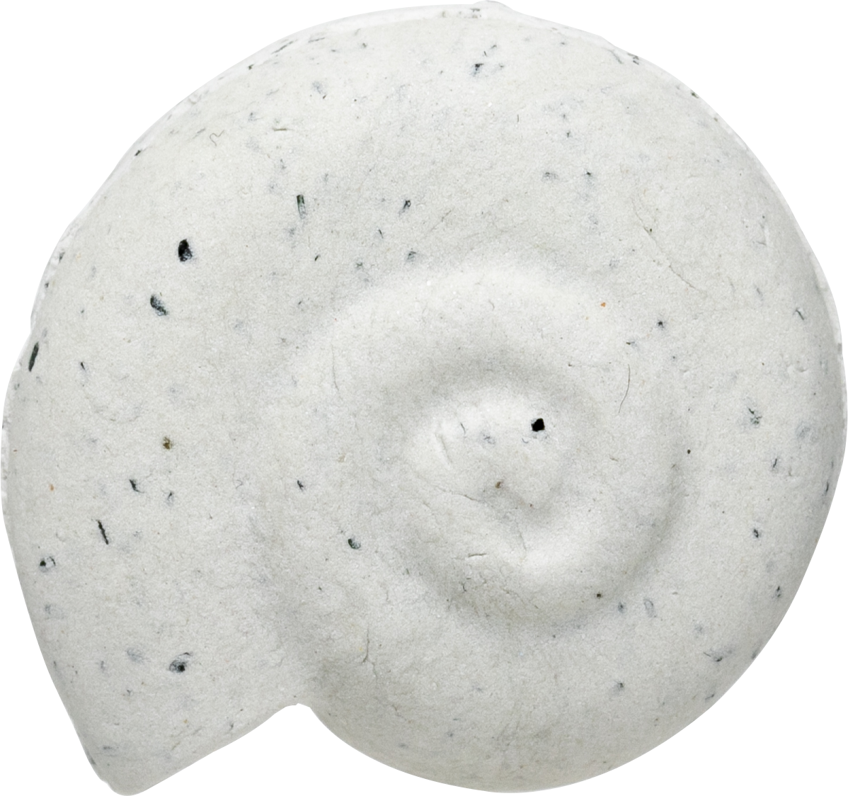 Detail of a finished Rock Clay piece after drying, showing the matte granular stone-like surface and the fine detail the clay holds.
