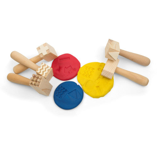 Educational Colours Wooden Pattern Hammer Set of 5. Wooden pattern hammers in use pressing designs into modelling clay.