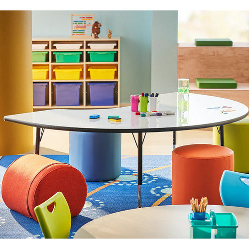 Jellybean-shaped dry-erase table suitable for group learning in a school classroom setting