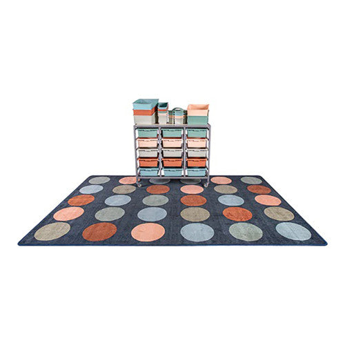 Elizabeth Richards Colours of Australia Circle Rug showing 30 earthy-toned circle segments arranged on a classroom floor